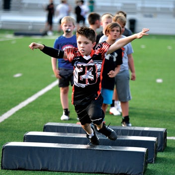 An opportunity to share... Jr. Cyclone Camp brings together present and ...